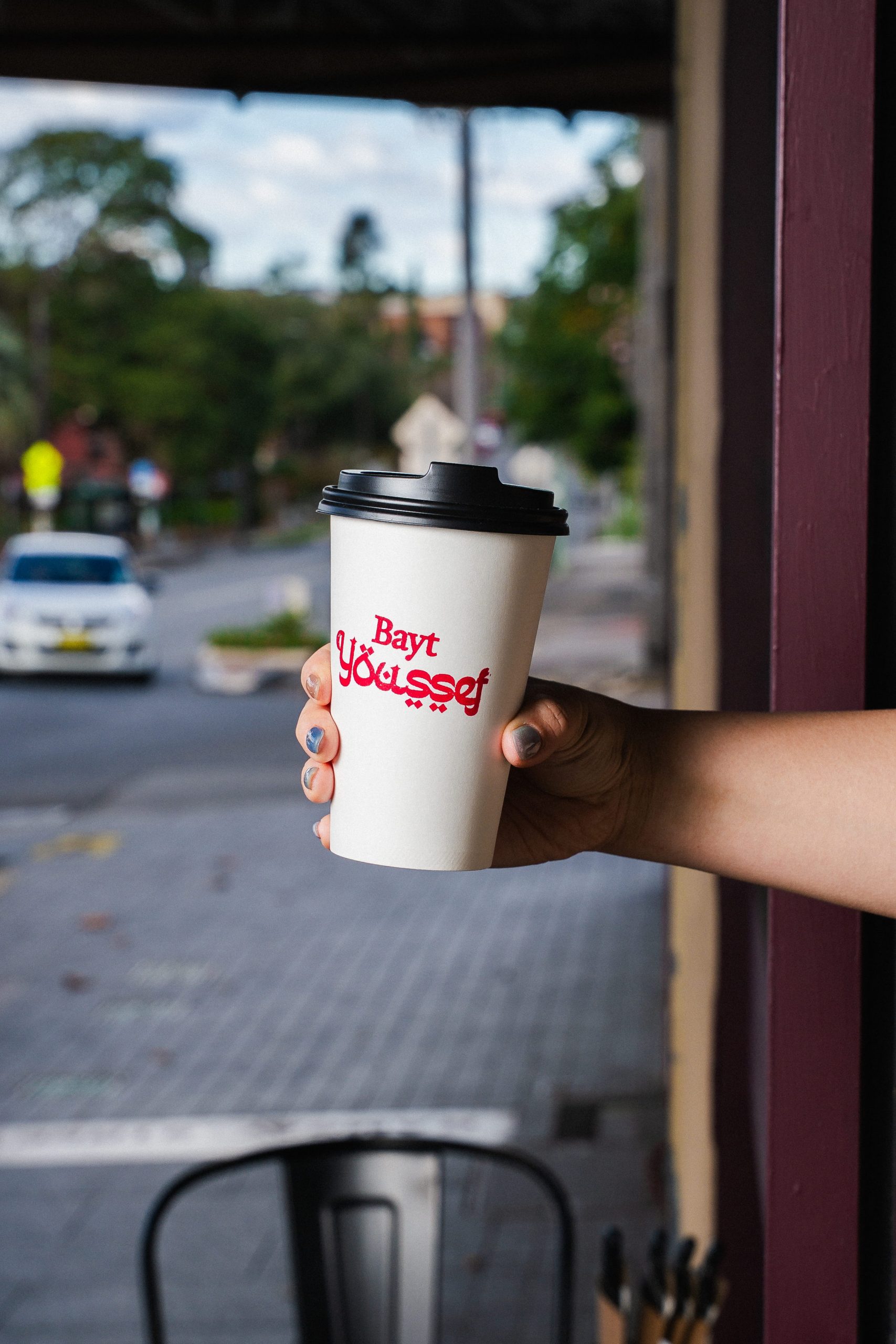 Bayt Youssef branded takeaway coffee cup