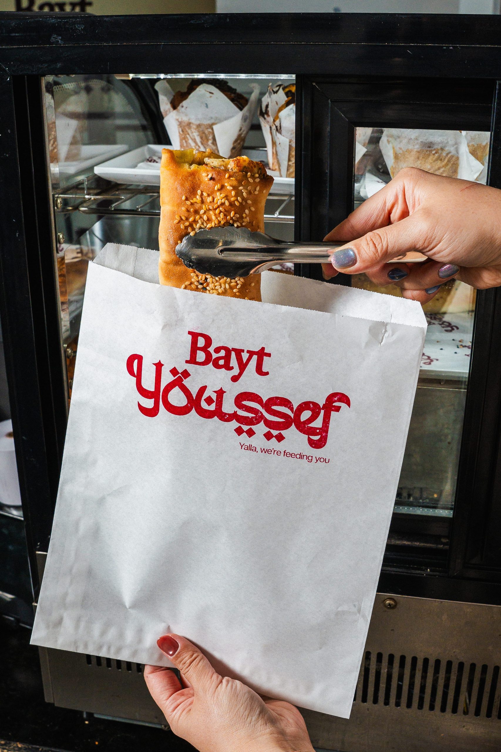 Bayt Youssef branded takeaway packaging designed by AIIMS Group