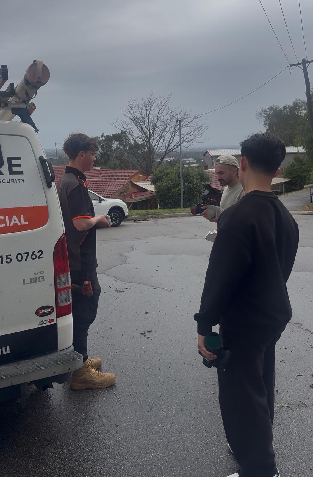 Brillare team and production crew working beside a service vehicle