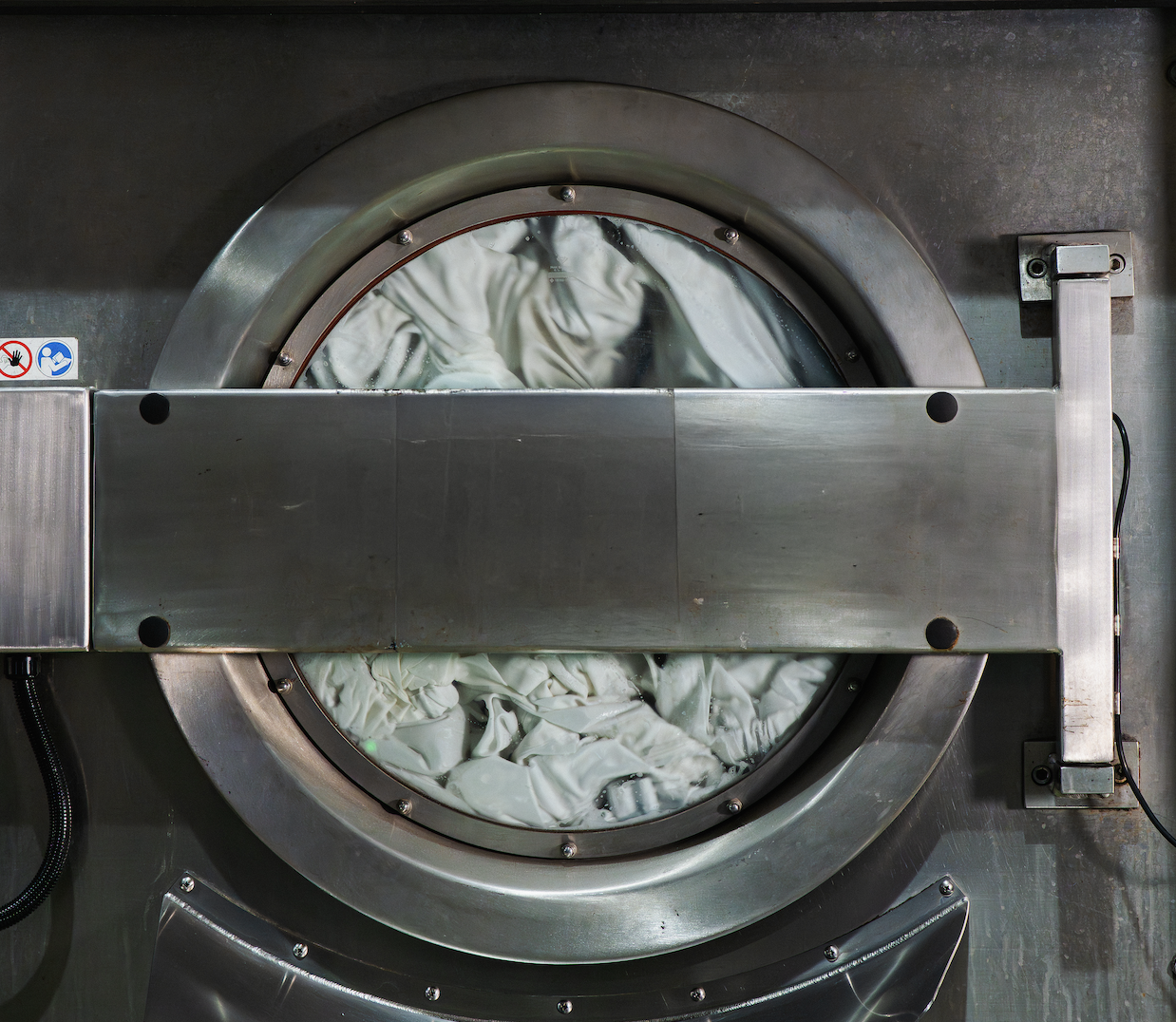 Commercial laundry processing at an Alsco New Zealand facility