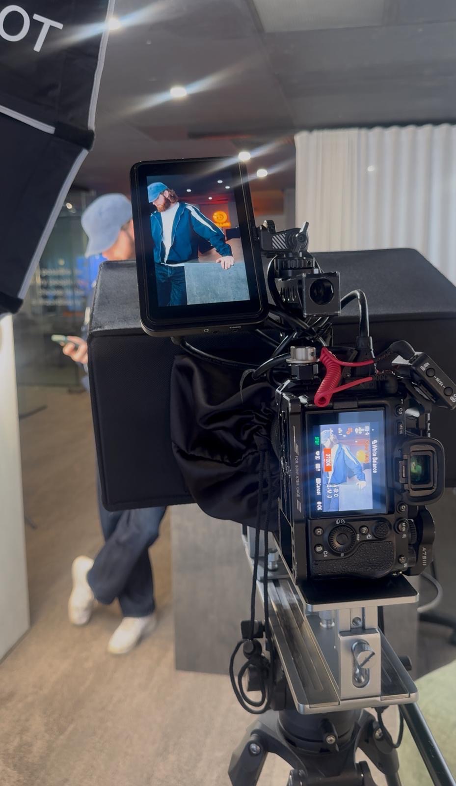 Professional camera monitor capturing a Brillare team scene