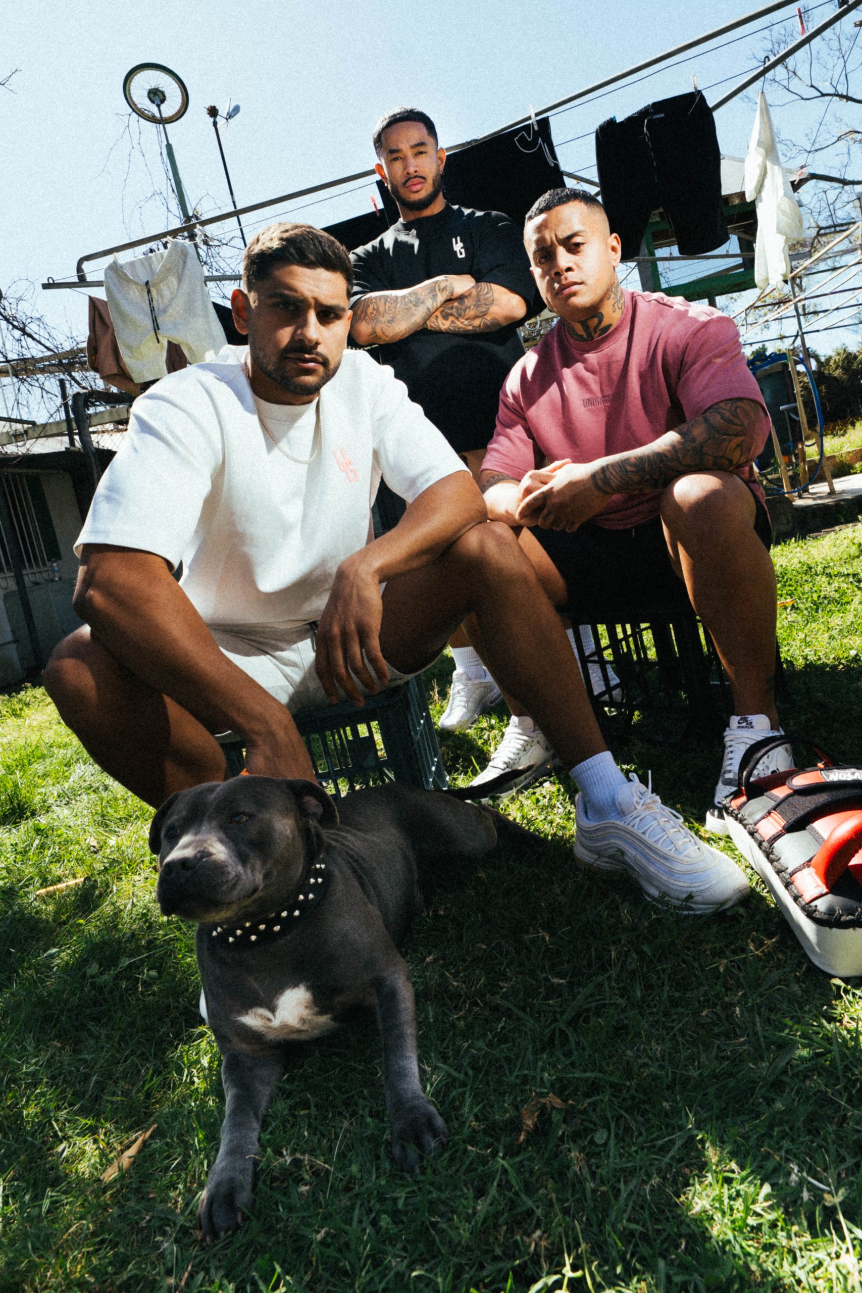 UNDRGROUND campaign models wearing streetwear in an outdoor scene